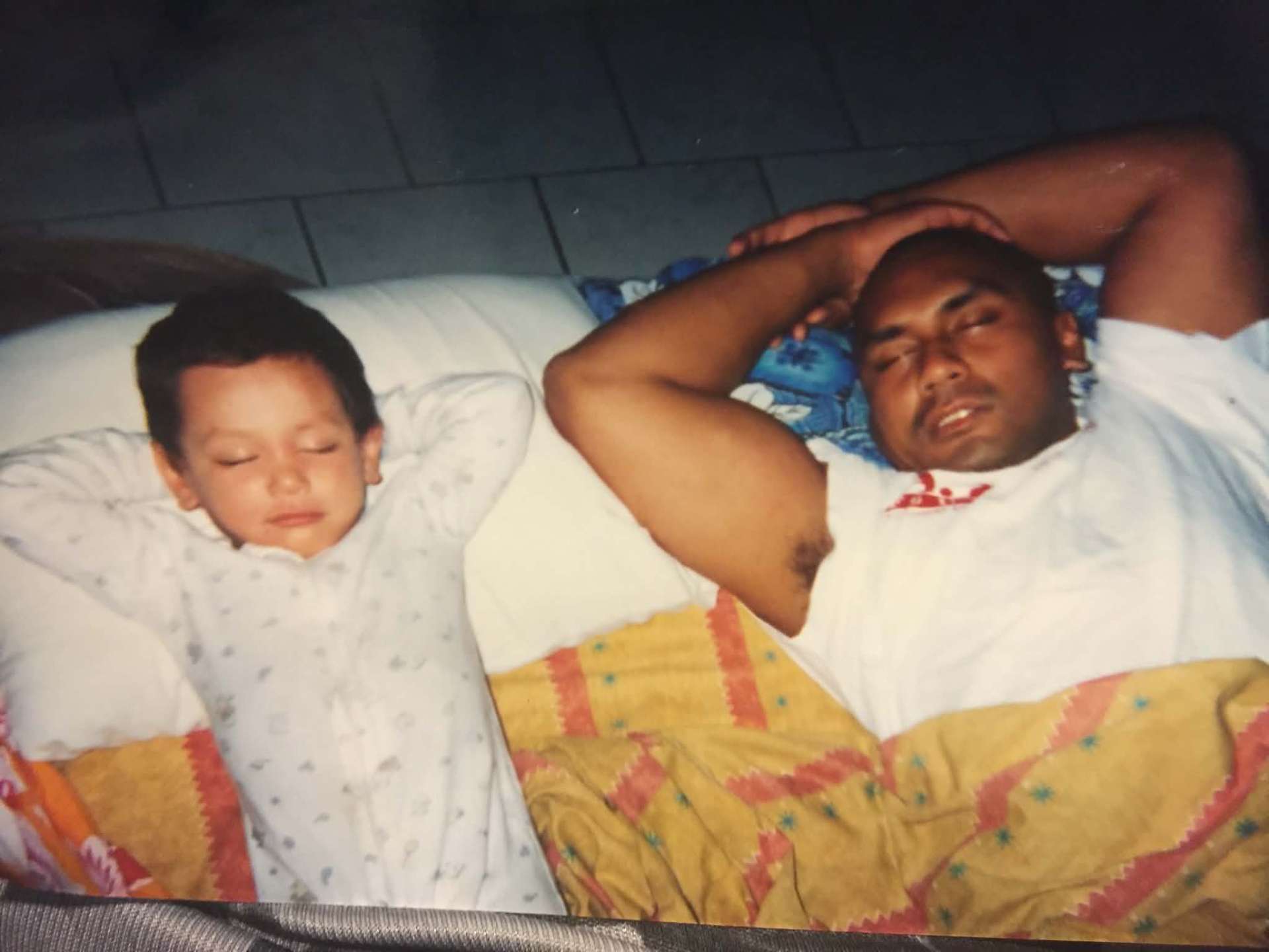 McCann Sr. and young Josiah napping together