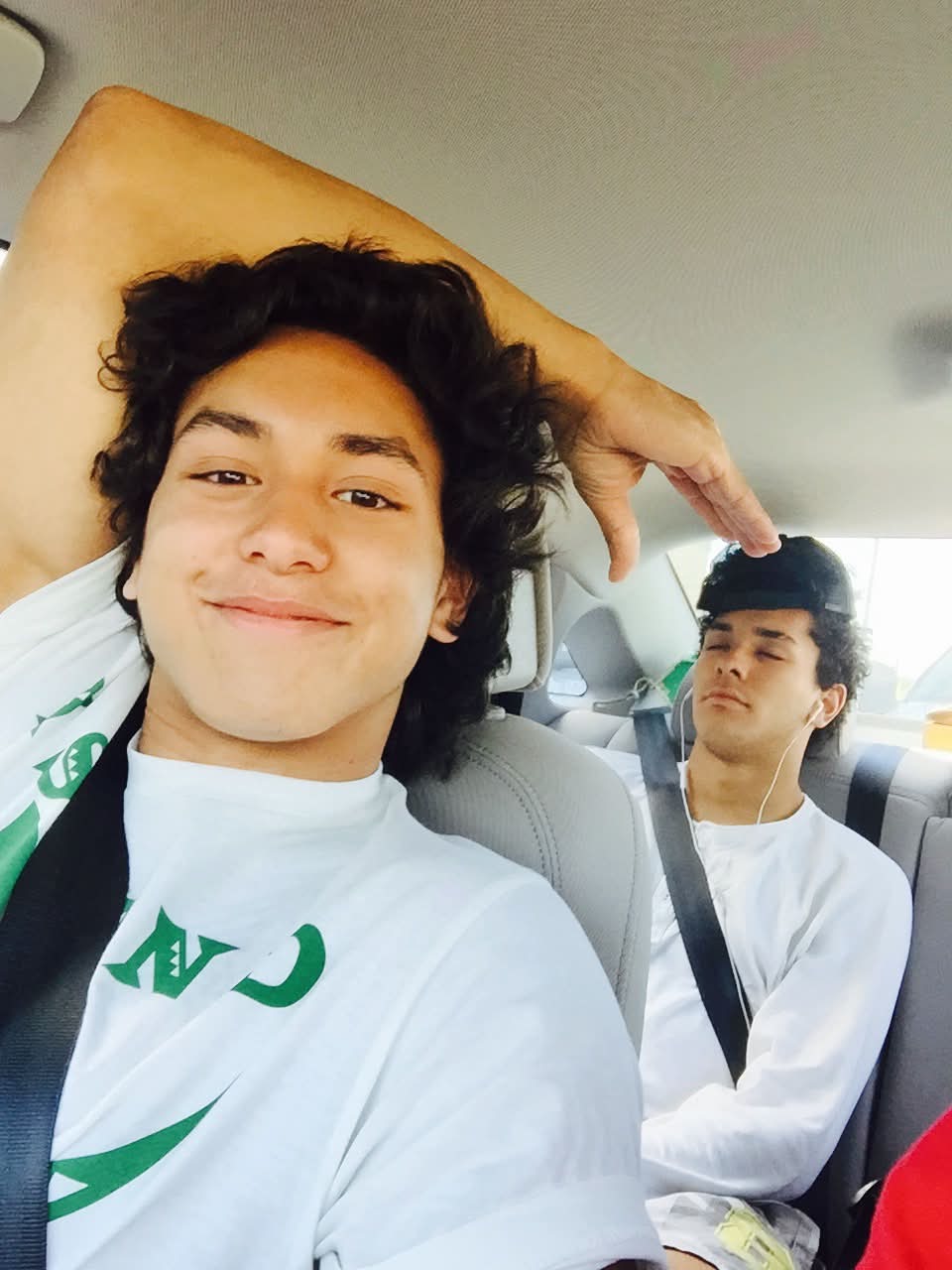 McCann Jr. and Josiah riding in the car together