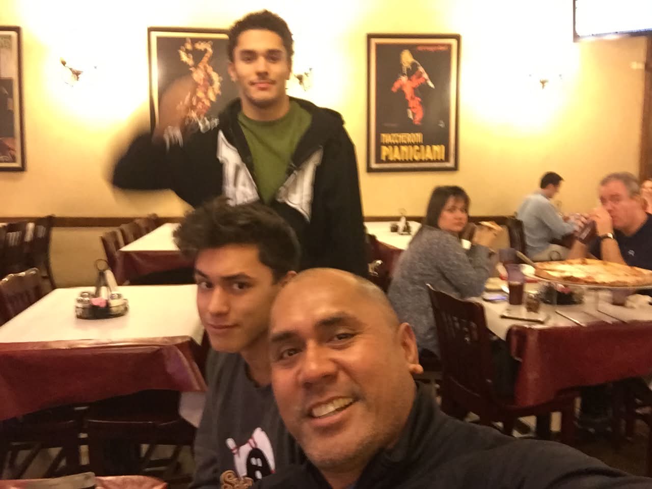 Dad with McCann Jr. and Josiah at an Italian pizzeria