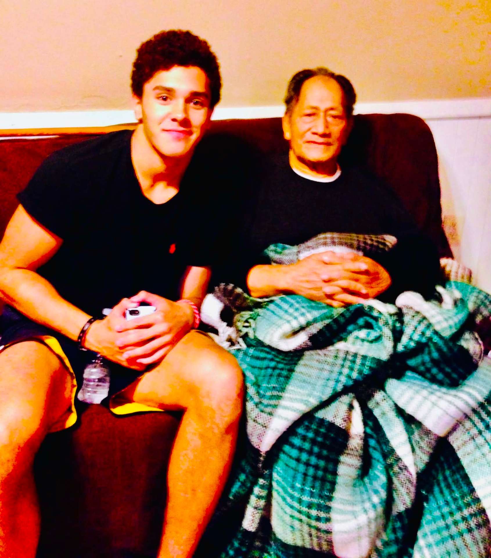 McCann Jr. sitting with his grandfather