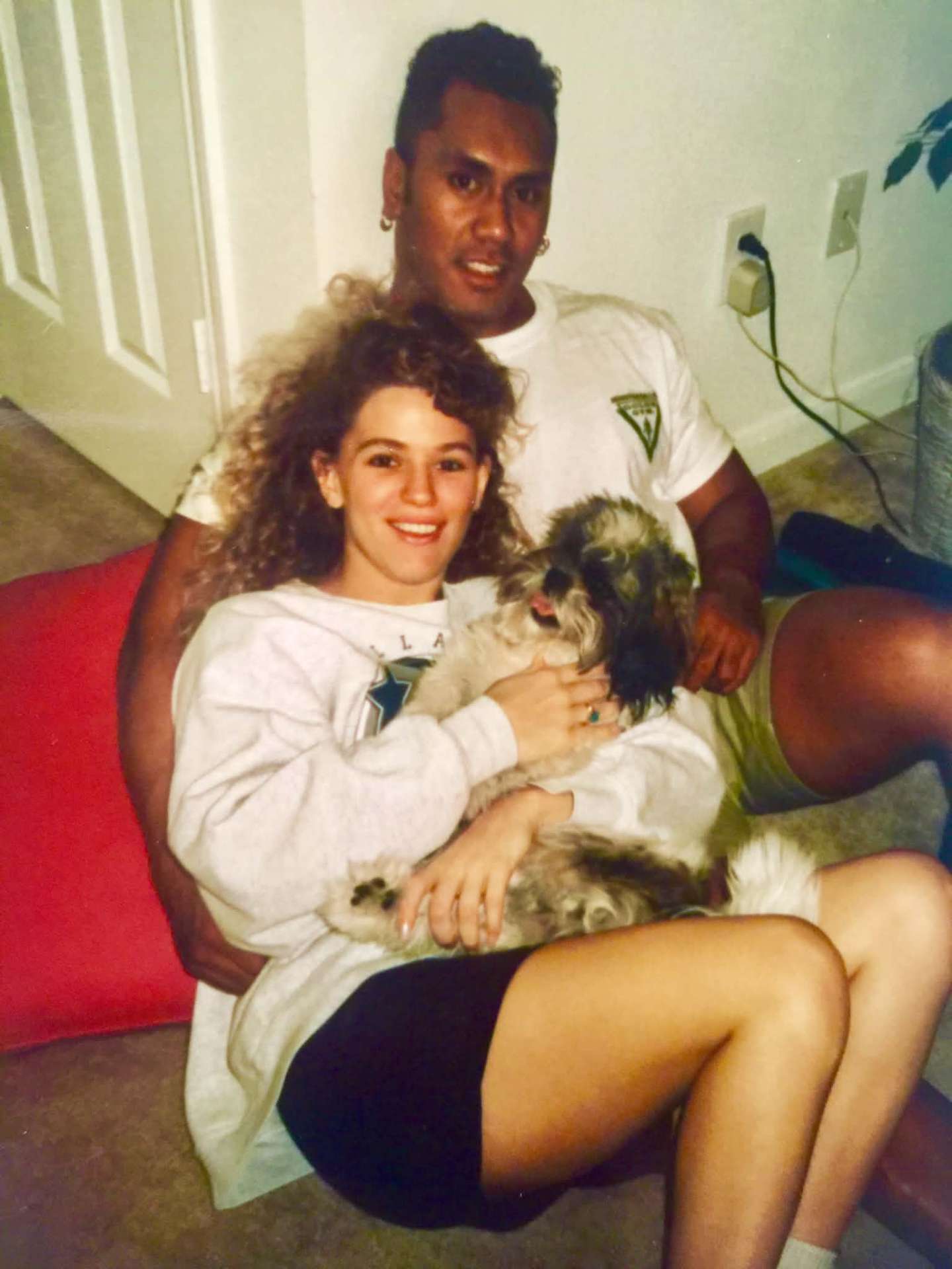 Stacy and McCann at home with their dog