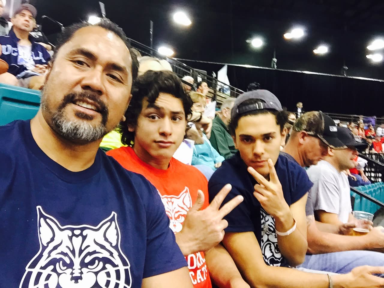Dad with McCann Jr. and Josiah at an Arizona Wildcats game