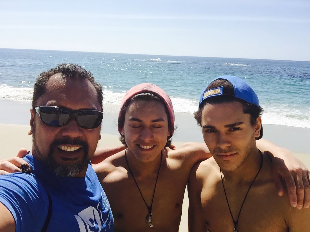 Dad with McCann Jr. and Josiah at the beach