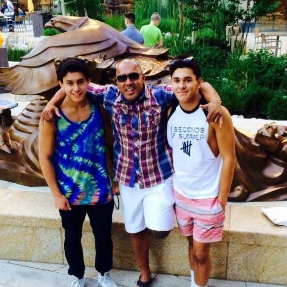 Dad with McCann Jr. and Josiah at the turtle fountain