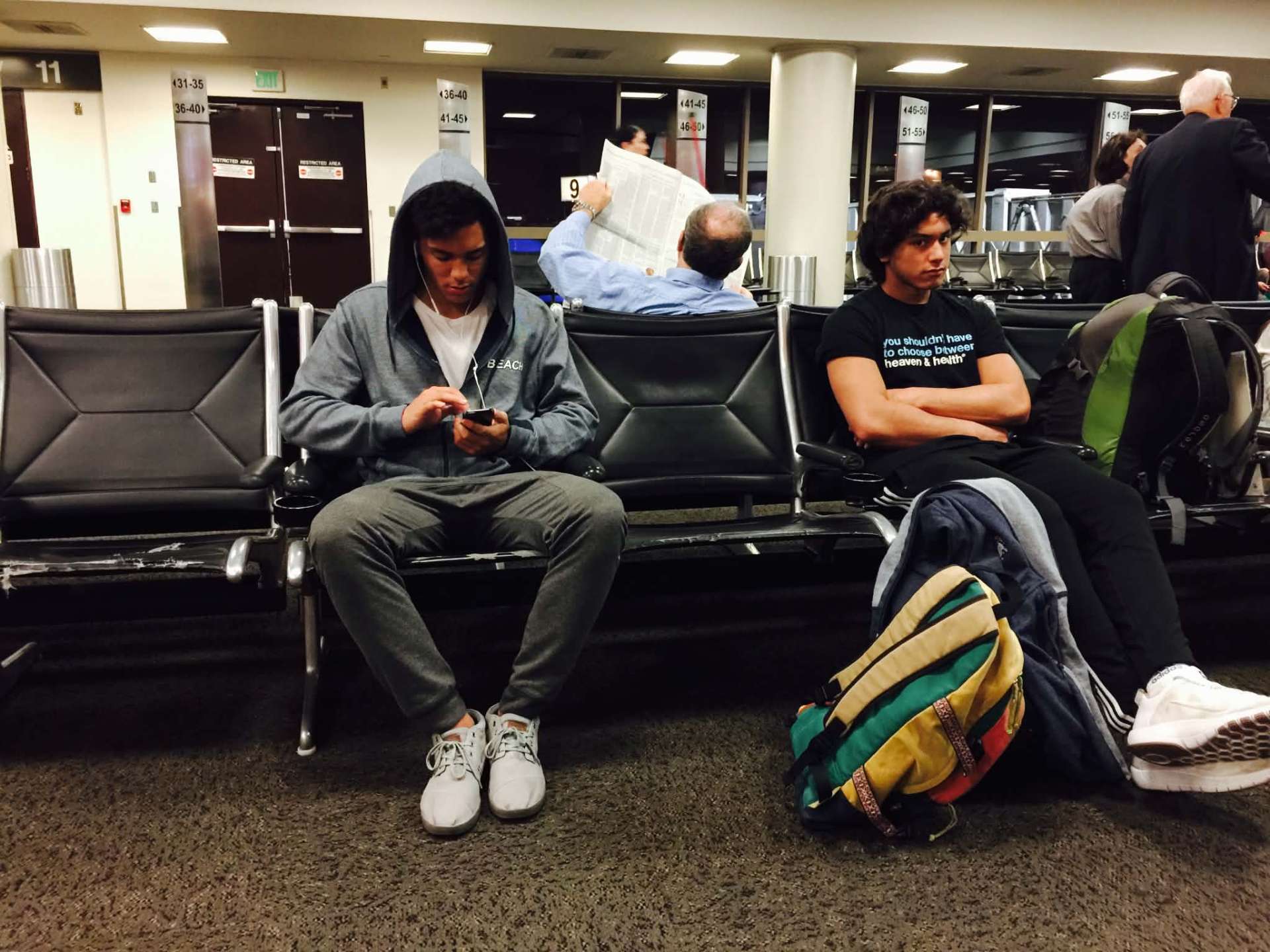 McCann Jr. and Josiah waiting at the airport