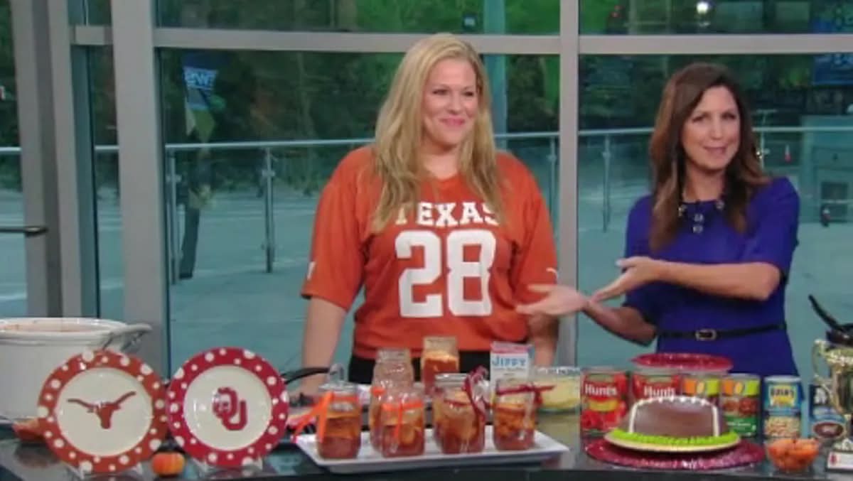 Stacy on a TV segment wearing a Texas jersey