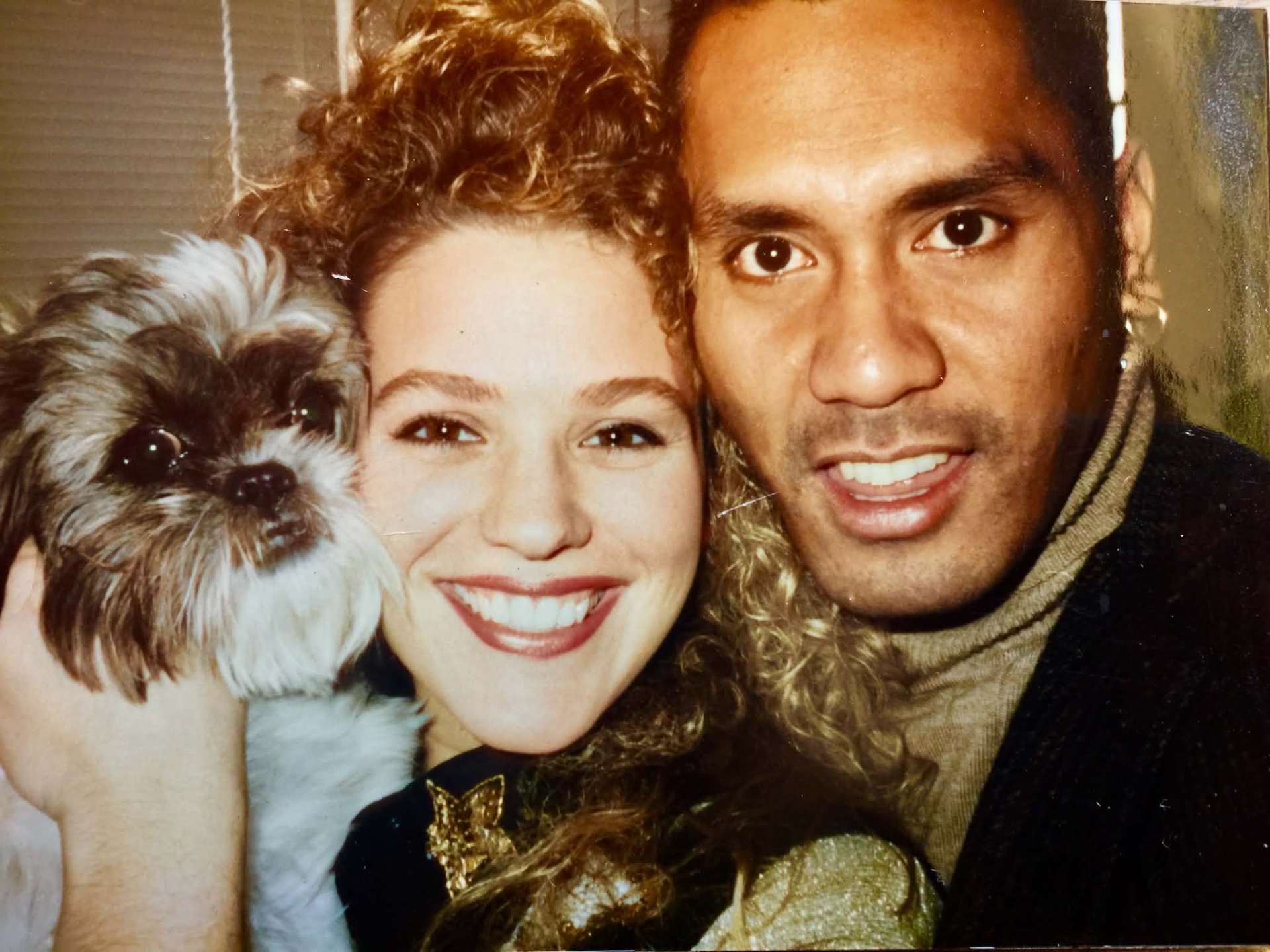 Stacy and McCann holiday portrait with their dog